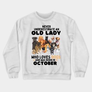 Never Underestimate An Old Lady Who Loves Dogs And Was October Crewneck Sweatshirt